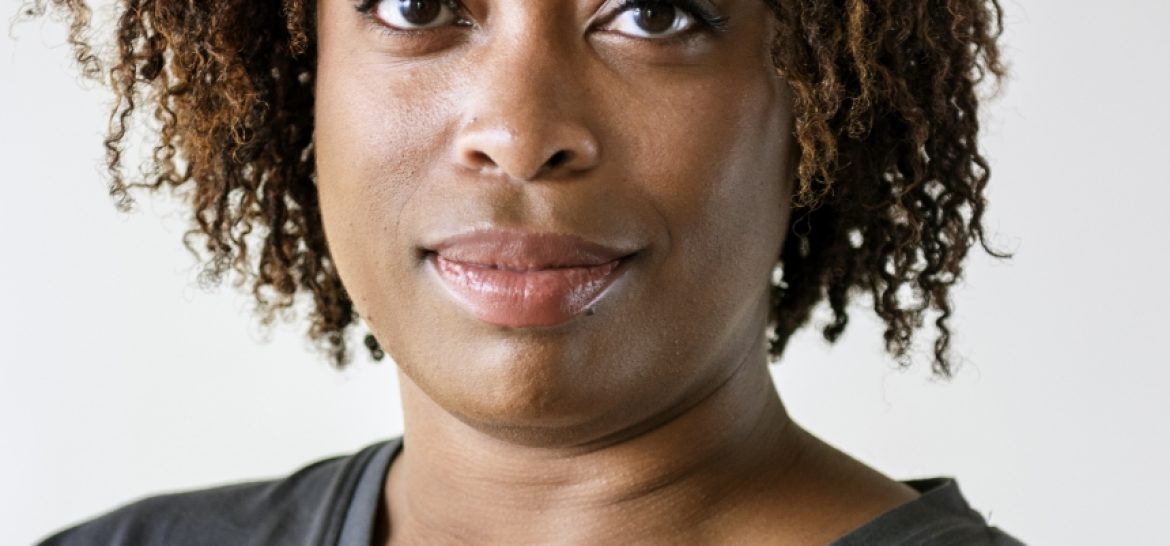 portrait-of-cheerful-black-woman-P2LPRUG-1.jpg